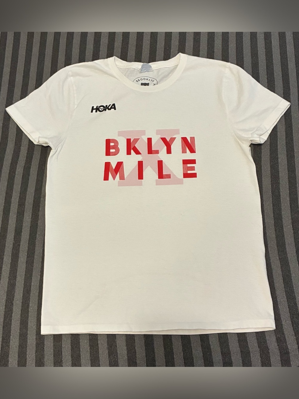 HOKA Women's White BKLYN MILE Limited Edition Race Tee with Red Logo Size S